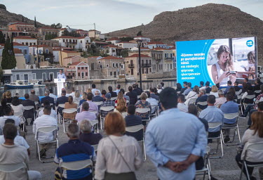 Greek Prime Minister Kyriakos Mitsotakis addresses locals during a visit to the island of Halki, near Rhodes, where he opened the island's one megawatt solar array and presented the island's municipal...