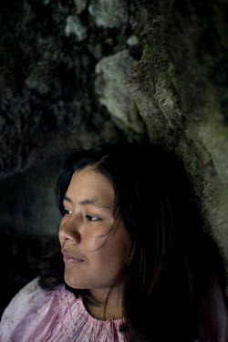 Lizeth Tuquerres (15), a Karanki indigenous woman, during a morning visit to the three waterfalls (Las Tres Cascadas).