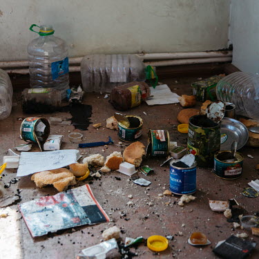 Food tins, uniforms and signs of soldiers and military litter the rooms of a former school used by Azeri military during the 2020 Nagorno-Karabakh war with Armenia.