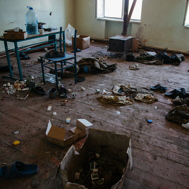 Food tins, uniforms and signs of soldiers and military litter the rooms of a former school used by Azeri military during the 2020 Nagorno-Karabakh war with Armenia.