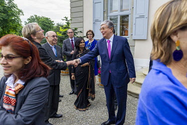 Kassym Jomart Tokayev (with purple tie) at a diplomatic event when he was Director General of the United Nations in Geneva.