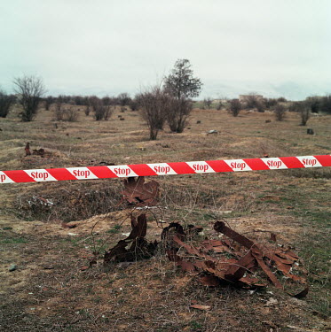 A former graveyard taped-off to prevent people entering what is a heavily mined area on the outskirts of Agdam. The city reverted to Azeri control as a result of the 2020 Nagorno-Karabakh war with Arm...