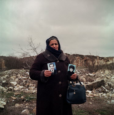 Aliyeva Malahat holding photos of missing family members in the centre of Agdam, a city destroyed and depopulated during the first Nagorno-Karabakh war that was retaken by Azeri forces during the 2020...
