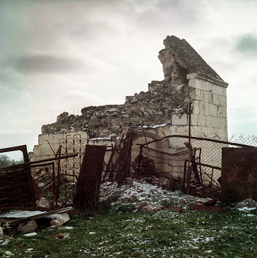Part of a destroyed building at a site used as a shrine to the last Khanat of Karabakh. The area was held by Armenian forces until re-taken by the Azaris during the 2020 Nagorno-Karabakh war. During t...
