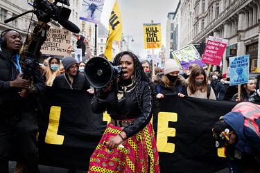 Kill the Bill march from Lincolns Inn Fields to Parliament Square protesting the Police Crime Sentencing and Courts Bill. Marvina Newton campaigner for Black Lives Matter and XR Unify with a megaphone...