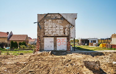 A house that survived the demolition after a rare violent and deadly multiple vortex tornado swept through several villages in South Moravia on 24 June 2021, killing six people and leaving about 200 i...