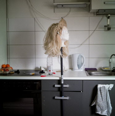 Shayma's drag wig being prepared in their kitchen. Shayma identifies as non binary and uses they/them pronouns. Shayma is a Tunisian drag performer and long time LGBTI activist who relocated to German...