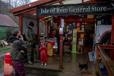 Islanders gather at the island's only shop in Kinloch.