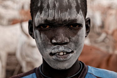 People rub ash from burnt cow dung onto their bodies, they say it acts as an insectrepellent.