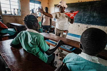 A Mines Advisory Service (MAG) explosive ordnance risk education session with school children in Pajok. These lessons are especially important for children which are especially vulnerable due to their...