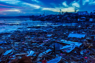 The total destruction by Typhoon Rai of shore dwellings in Barangay Poblacion towards Barangay Fatima as seen in the days after typhoon Rai struck the coastal communities.  The impact in this area was...
