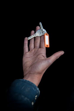Abdul, 17, with the keys to his home in Aleppo that he fled 3 months previously. He says of his home: "It's everything".  Syrian Nakba, Keys of home. The front-door keys to the homes of some of the es...