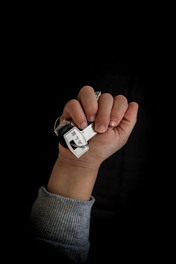 Karim, 5, with the keys to his home in Idlib that he fled 2 years previously. He describes his home as ^My games, my toys^.Syrian Nakba, Keys of home.The front-door keys to the homes of some of the es...