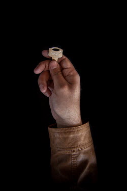 Bashir, 30, with the keys to his home in Raqqah that he fled 2 months 1 week previously. He describes his home as "everything".  Syrian Nakba, Keys of home. The front-door keys to the homes of some of...