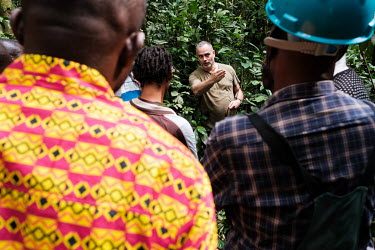 Dr Nils Bourland with participants in a wood biology workshop in the forest at the Yangambi research station. Participants were predominantly traders, harvesters or users of artisanal logging products...