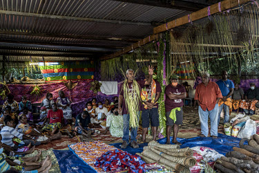 A clad leader addresses guests at the traditional 'Kanak' wedding of Jacques Atti (42) from the Touaourou Tribe and his bride, Sabrina Manique (42) from Lifou Island.