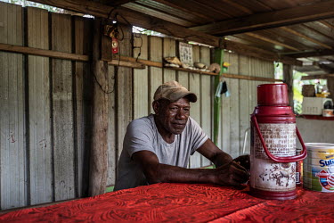 Alexis Vandegou (55), a former worker at the Prony Nickel mine and now a fisherman sits at home in Goro.
