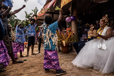 Dancers from Lifou perform a traditional dance at the wedding of Jacques Atti (42), from the Touaourou Tribe, and Sabrina Manique (42), from Lifou Island, during their 'Kanak' clan wedding in Goro. Bo...