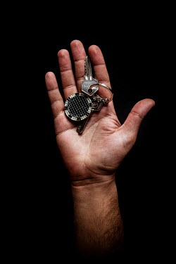 Aboud, 32, with the keys to his home in Lattakia that he fled 9 months previously. He describes his home as ^my memories^.Syrian Nakba, Keys of home.The front-door keys to the homes of some of the est...