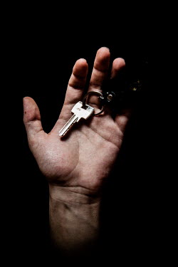 Nour, 25, with the keys to their home in Mara'at al Nouman, Idlib from where they fled 7 months previously. He describes his home as "Lonely".  Syrian Nakba, Keys of home. The front-door keys to the h...