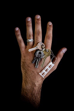 Rashed, 26, with the keys to his home in Deir Ezzour that he fled 1 year previously. He describes his home as ^I miss everything^.Syrian Nakba, Keys of home.The front-door keys to the homes of some of...