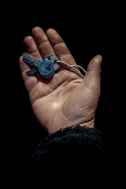 Amina, 38, with the keys to her home in Idlib, that she fled 1 year and 9 months previously. She describes her home as ^My life^.Syrian Nakba, Keys of home.The front-door keys to the homes of some of...