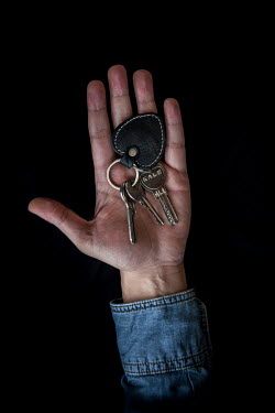 Bashar, 34, with the keys to his home in Latakia that he fled 3 years previously. He describes his home as ^relaxation and safety^.Syrian Nakba, Keys of home.The front-door keys to the homes of some o...