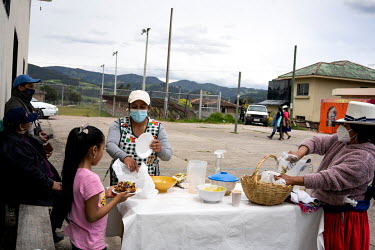 Women of the Austro Agroecological Organisation selling their organic food in the central square of the Guallanzhapa community. They create small local markets as a response to their difficulties in t...
