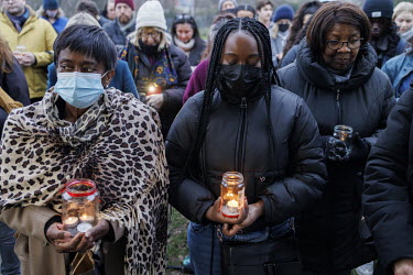 People hold candles at a vigil in Mountsfield Park to mark what would have been Ella Kissi Debrah's 18th birthday, if she hadn't died from an asthma attack brought on by air pollution. Her mother Rosa...