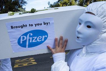 Demonstration arriving at the Place des Nations outside the UN against Covid 19 vaccination and masks for children. The cortege carried white coffins with childrens' names and 'brought to you by Pfize...