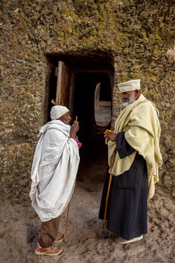 Two older men arrive at the Lalibela churches complex.