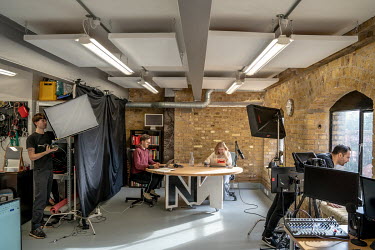 Staff at work in the Novara Media offices in south London.