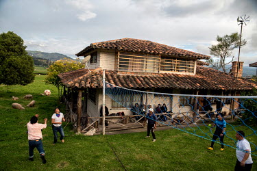 Yaku Perez (wearing scarf), Ecuadorian presidental candidate who finished in third place during the 2021 elections, playing volleyball with his neighbours at his home in the Tarqui community.