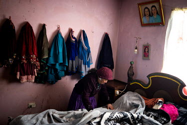 Leticia Aguilar (83) resting at her home. She is one of the eldest Kanaris indigenous women in the Gullanzhapa community who is still talking native Lenguaje 'Kichwa'. Her fragile health forces her t...