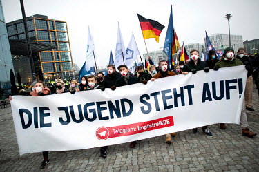 Protesters with banner reading 'The youth stands up' on a Telegram vaccination strike at a rally and demonstration by Junge Alternative JA, the youth organization of the right wing extremist party Alt...