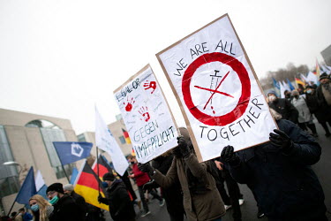 Protester with poster reading 'We are all together' at a rally and demonstration by the Junge Alternative JA, the youth organization of the right wing extremist party Alternative for Deutschland again...