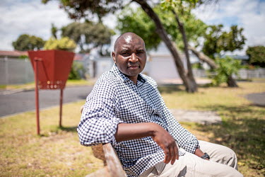 Benjamin Kagina, a vaccinologist with Vaccines for Africa, photographed in a park near his home in Cape Town, South Africa.