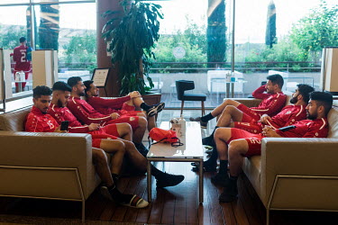 The Afghanistan national football team rest while at their training base at the Gloria Sports Arena before their international friendly match with Indonesia.
