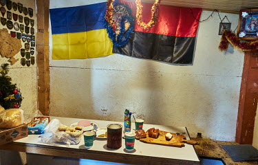 A table with food on it in the makeshift shelter of ASAP Rescue. ASAP Rescue is Christian NGO which evacuates and provides medical care for victims of the conflict between the Ukrainian government and...