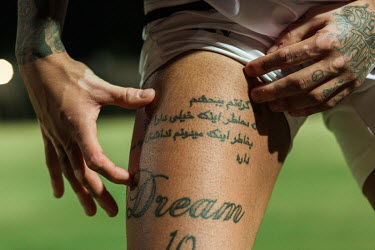 Faysal Sheyesteh of the Afghanistan national football team, reveals some of his tattoos which, he says, all have a personal significance. On his chest he has a scene where war planes drop hearts onto...