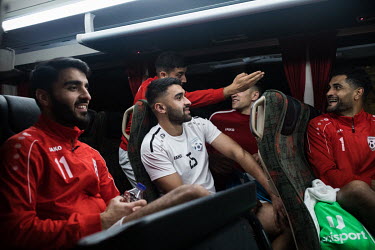 Players from the Afghanistan national football team on their bus, after a training session prior to their international friendly match with Indonesia.
