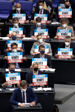 Protest action with signs 'Freiheit statt Spaltung' (freedom not division) against plans for compulsory vaccination. Centre sits Alice Weidel, leader of the parliamentary fraction of the right wing pa...