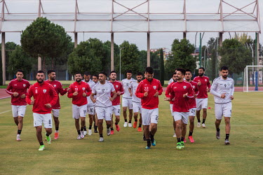 Afghan football players during a training session before their international friendly match with Indonesia.