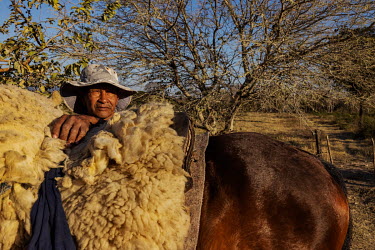 Pantaneiro Crescencio da Costa Soares with his horse at the Paiolzinho settlement. An original resident of a community in the Pantanal of Paiaguas that was permanently flooded by the 'breaking in' of...