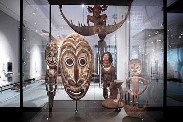 Masks and wooden figures on display during a press preview prior to the opening of the Ethnological Museum and Museum for Asian Art in the west wing of the Humboldt Forum. The opening of the museum an...