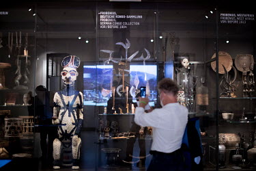 Masks and wooden figures from Cameroon and Congo on display during a press preview prior to the opening of the Ethnological Museum and Museum for Asian Art in the west wing of the Humboldt Forum. The...