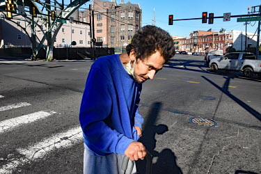 A man begs from passing traffic on a street in North Philadelphia, between Huntingdon and Allegheny on the elevated Market-Frankford subway. This is the epicentre of the city's opioid (fentanyl) drug...