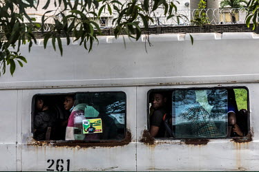 Passengers travelling in a commercial transportation bus, popularly known as 'Danfo', along the Lekki-Epe expressway, which is notorious for its traffic jams.