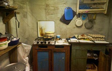 A makeshift kitchen at a military intelligence guard post five miles from the frontlines.