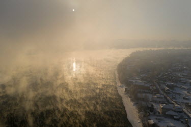 Frozen banks along the Angara River which never freezes because of its fast flow rate.